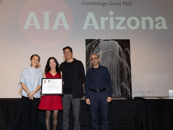 Teresa Rosano winning AIA Educator of the year award