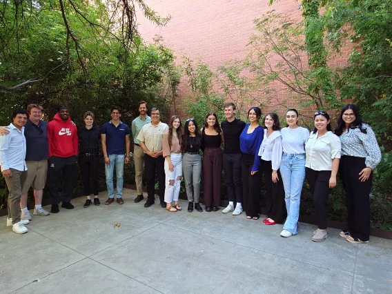 Group of students and faculty posing for a picture. 