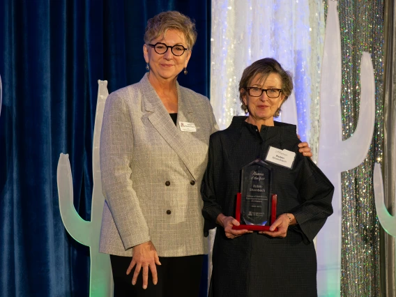 Nancy Pollock-Ellwand and Robin Shambach posing for a photo during the U of A Alumni of the Year event