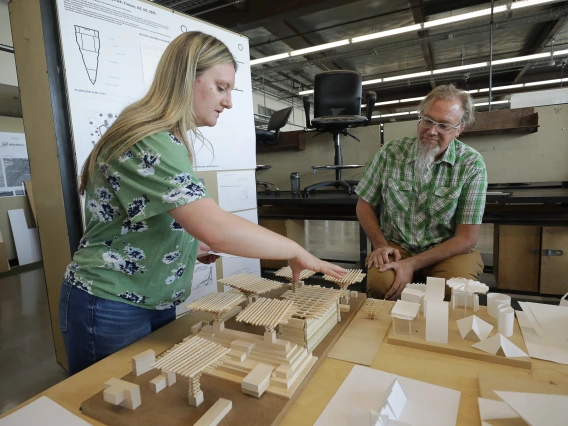 Student showcasing her model. 