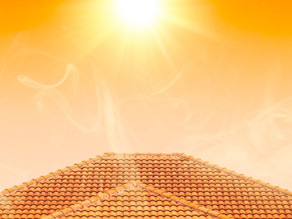 Sun over residential tiled roof