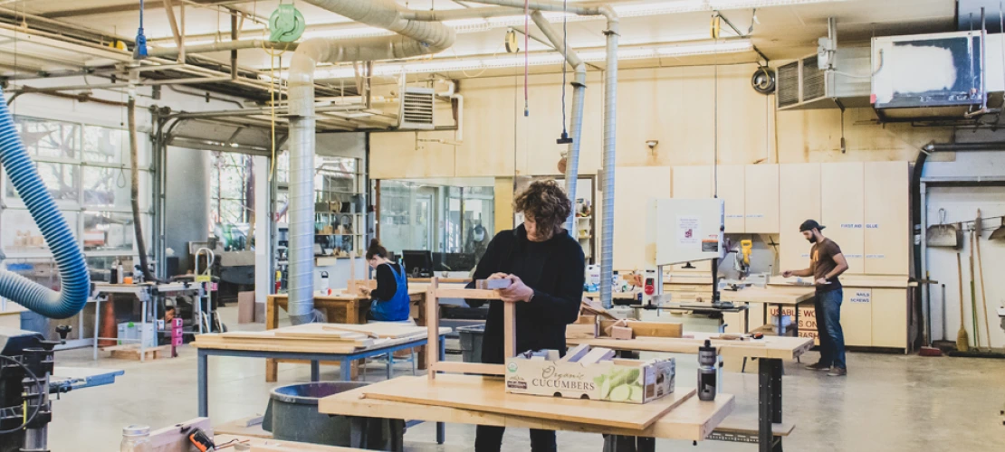CAPLA students working with wood in the wood lab in the materials lab at the college of architecture, planning and landscape architecture