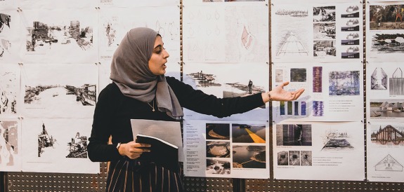Architecture student presenting during review