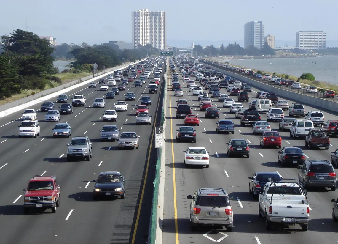 Bird's eye view of ten lanes of traffic on the Eastshore Freeway in Berkeley, looking south toward Pacific Park Plaza in Emeryville