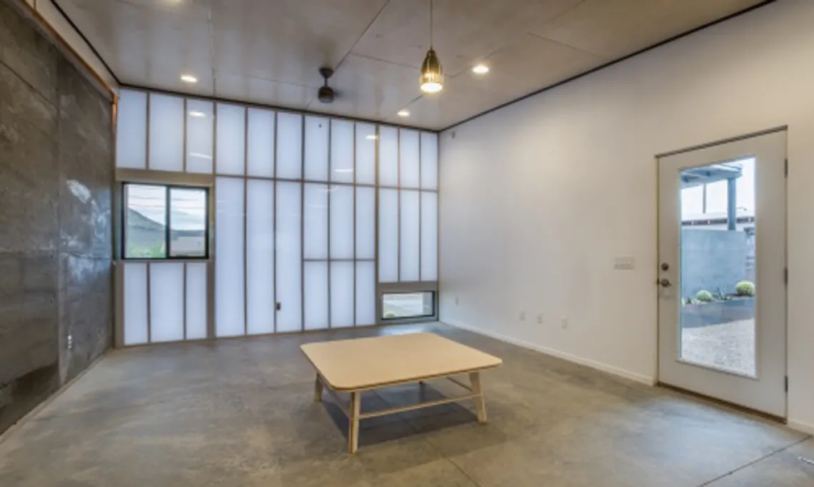 4 Living room looking north to polycarbonate wall