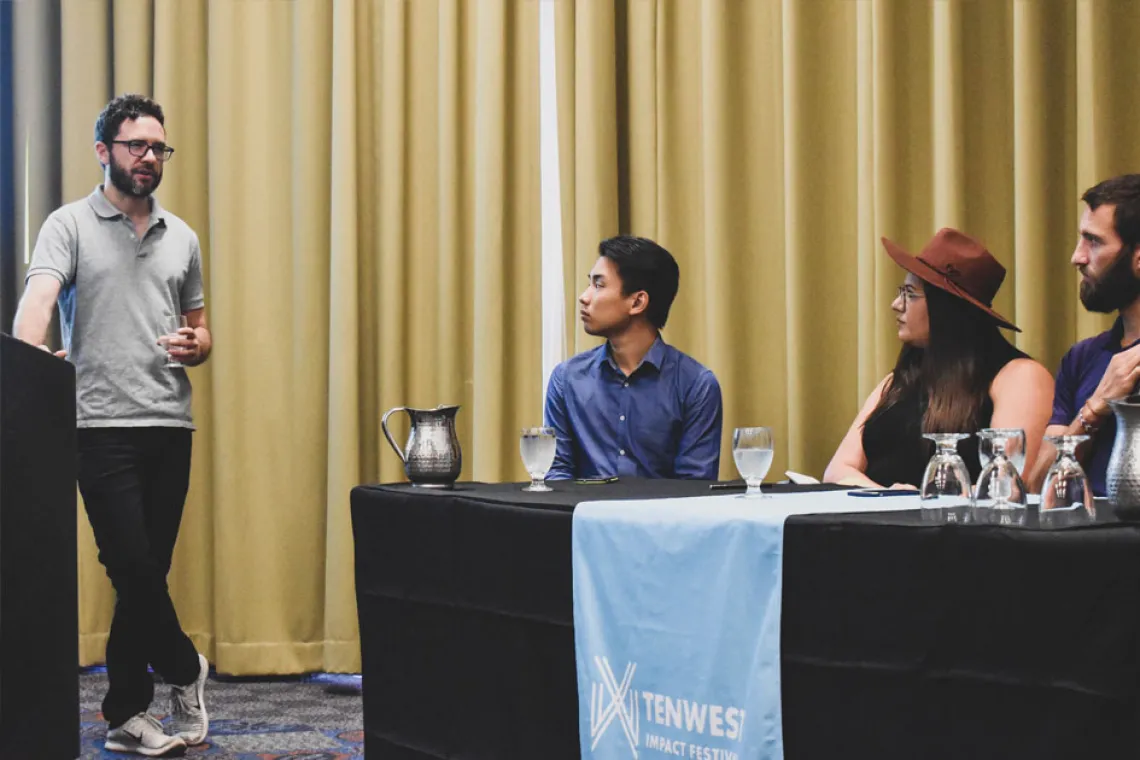 Brian Ringley of WeWork addresses a student panel during Robotics and Construction Automation