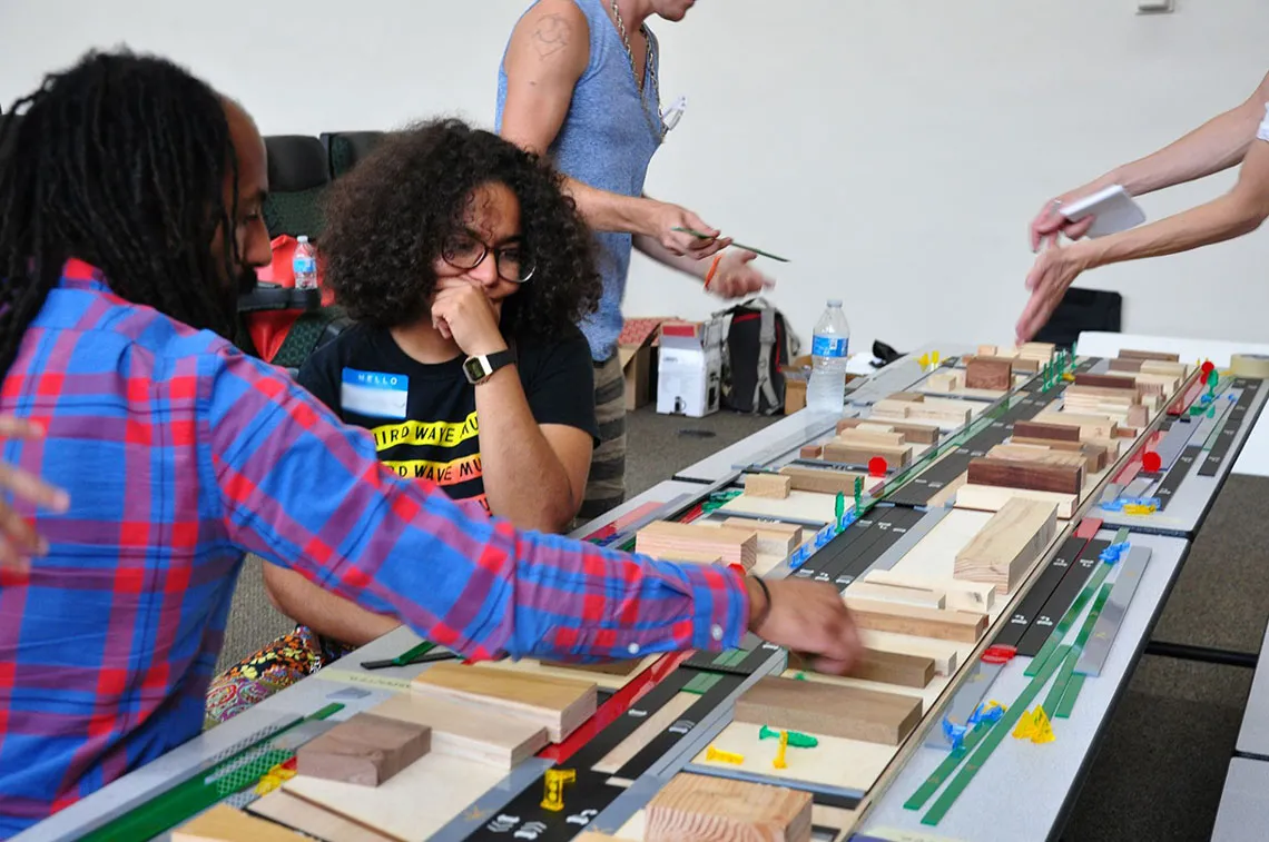 Kenneth J. Kokroko collaborates with a community member to prioritize streetscape improvements