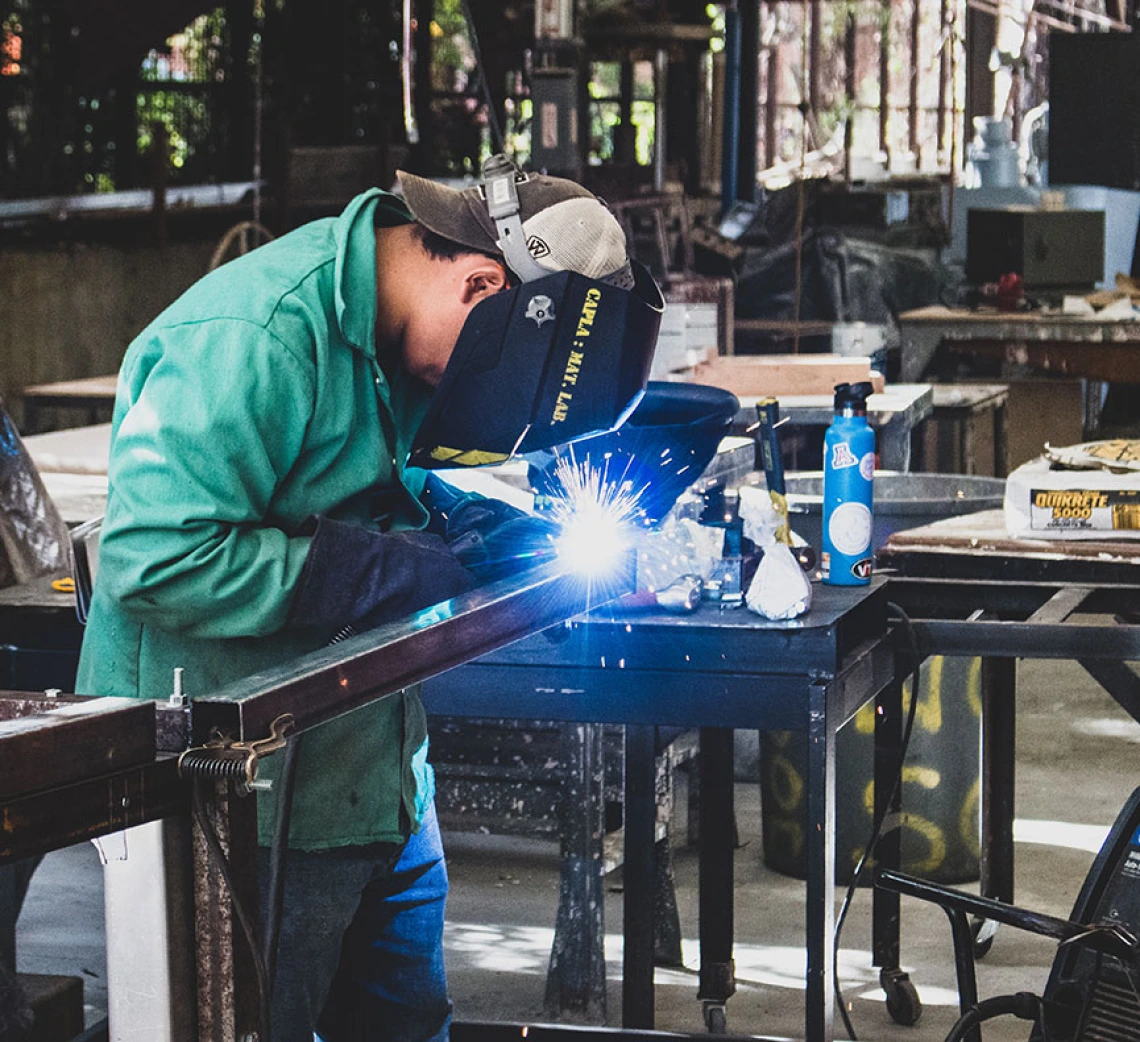 Student welding in the Materials Lab