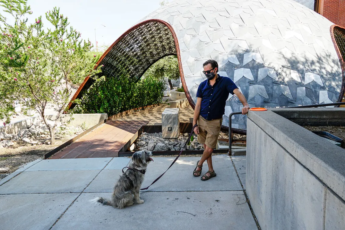 Planning Professor Philip Stoker and his dog Scraps at the Gridshell