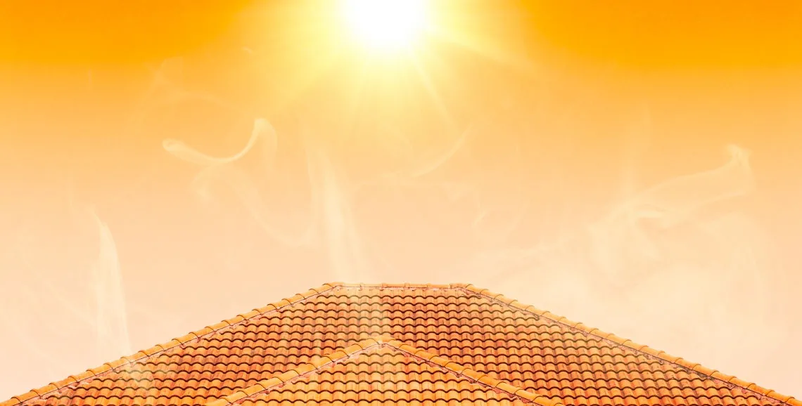 Sun over residential tiled roof