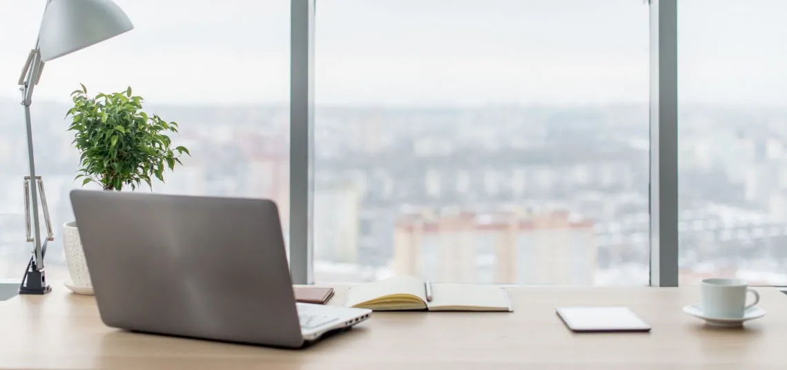 Desk in office with window