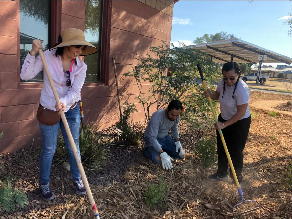 UA students install green infrastructure alongside Star Academic High School students.