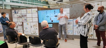Kirk presenting in front of the LAAB-site visit team. 
