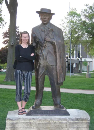 Lisa D. Schrenk with Frank Lloyd Wright Statue