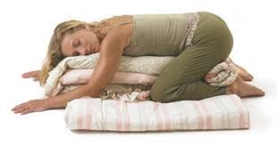 Yoga: Child's Pose with blankets